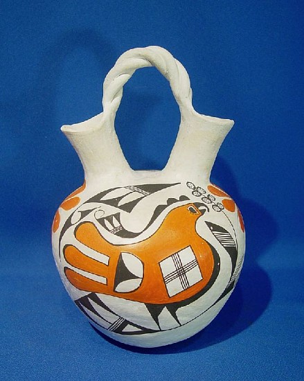 03 - Pueblo Pottery, Acoma Pottery: c. 1970s Wedding Jar by Eva Histia, Parrot Motif, Braided Bail (10.75" ht x 6.5" d)
c. 1970s, Hand coiled clay pottery