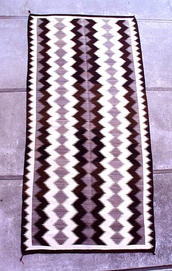 01 - Navajo Textiles, Navajo Rug: Rare Runner with Lightning Motif (60" x 144")
1930, Handspun wool