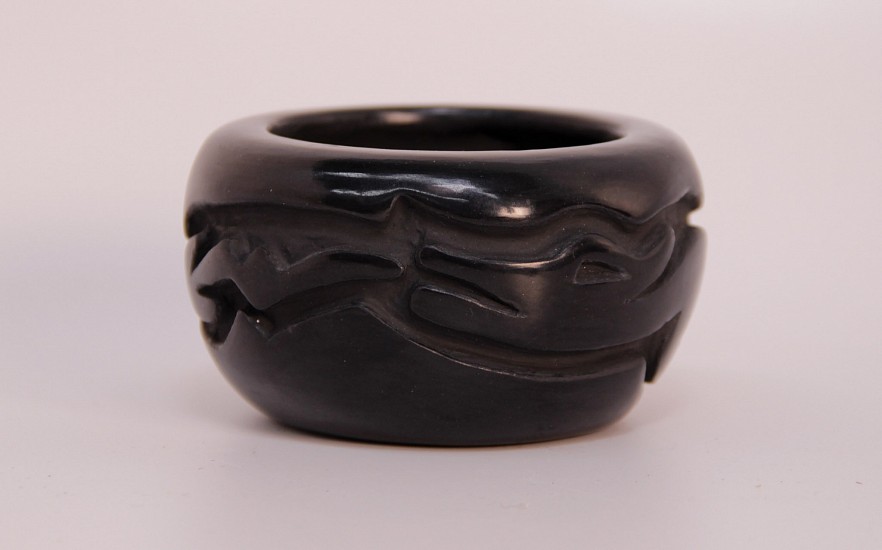 03 - Pueblo Pottery, Santa Clara Pottery: c. 1980s Blackware by Billy Cain, Avanyu (2" ht x 3 1/4" d)
c. 1980s, Hand coiled clay pottery
