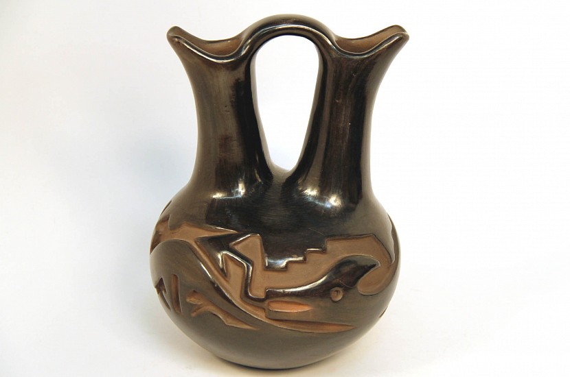 03 - Pueblo Pottery, Santa Clara Pottery: Carved Blackware by Florence Naranjo, Avanyu Motif (10" ht x 7.5" d)
Hand coiled clay pottery