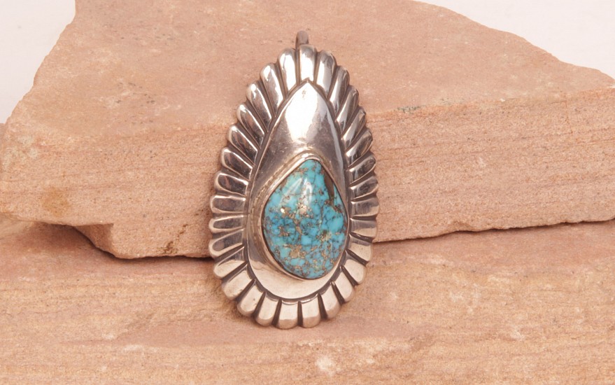 07 - Jewelry-Old, Navajo Pendant from Red Mesa: Oval Form, Single Turquoise Setting (2 1/4" x 1 3/8")
c. 1970, Sterling Silver and Turquoise