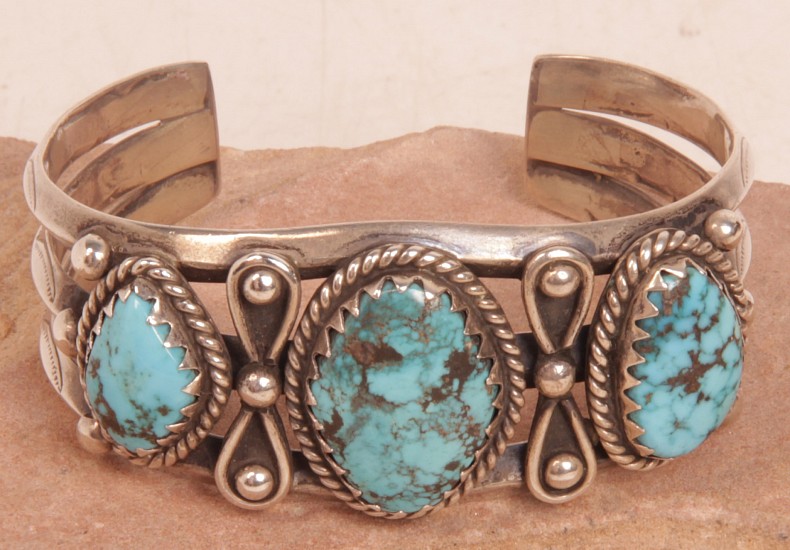 08 - Jewelry-New, Navajo Cuff Bracelet: Three High Grade Turquoise Settings, Sterling Silver Beadwork and Bowtie Accents, Three Rods (5.5" + 1.25" gap)
c. 1980, Sterling Silver and Turquoise