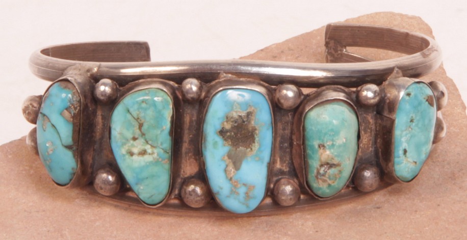 08 - Jewelry-New, Navajo Cuff Bracelet: Five Turquoise Settings, Beadwork in Sterling Silver, Two Rods (5.5" + 1" gap)
c. 1970, Sterling Silver and Turquoise
