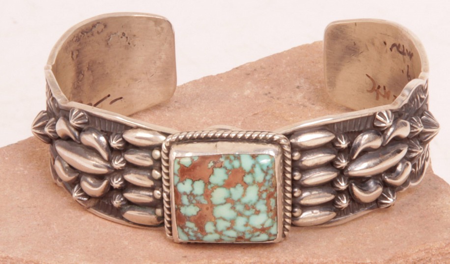 08 - Jewelry-New, Navajo Cuff Braclet by Darryl Becenti: High Grade Turquoise Mountain Setting, Square Cut, Early 20th Century Style, Repousse Embossed Sterling Silver (5 7/8" + 1" gap)
2014, Sterling Silver and Turquoise